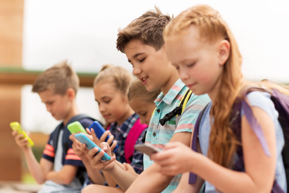 Can Phones and Tablets Cause Neck Pain in Kids in Kansas City?